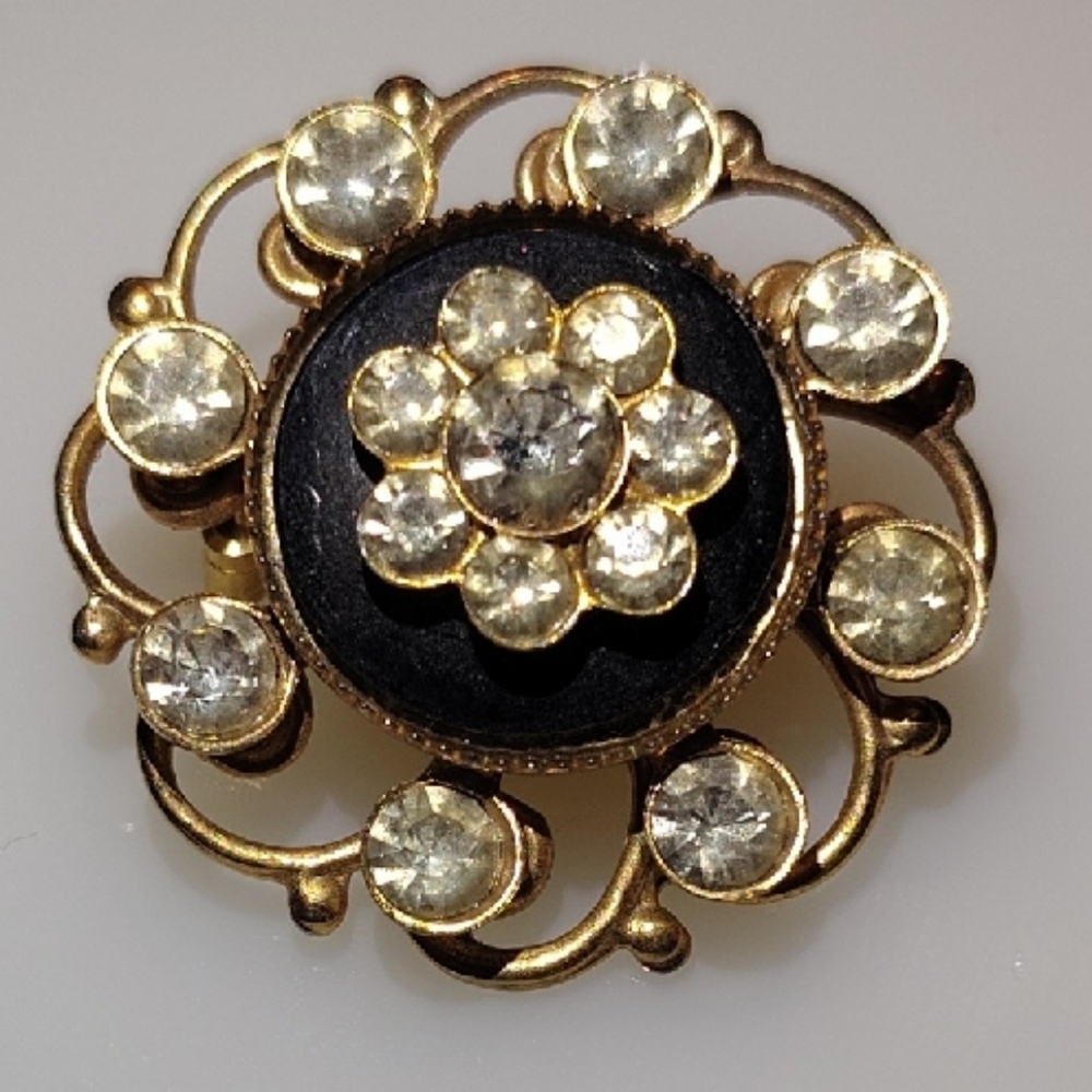 Elegant Gold Tone Black Floral Brooch